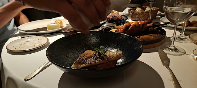 Raza Madrid Barquillo Phone number