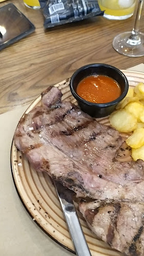 Opinii despre Restaurante La Marimorena Brasas în Sevilla - Gastronomía y hostelería