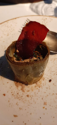 Raza Madrid Barquillo Phone number