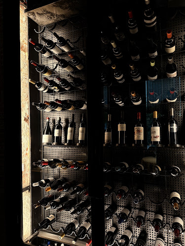 Raza Madrid Barquillo Phone number