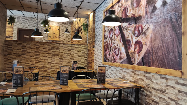 Pizzería Carlos - Gastronomía y hostelería