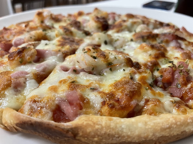 Comments and reviews of RESTAURANTE PIZZERÍA ARROCERÍA PLAZA