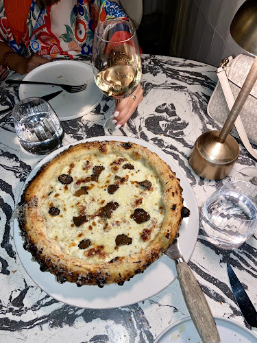 Restaurante Roostiq Marbella Phone number