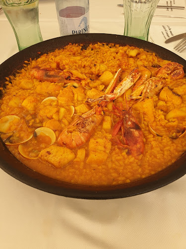 Comments and reviews of RESTAURANTE PIZZERÍA ARROCERÍA PLAZA