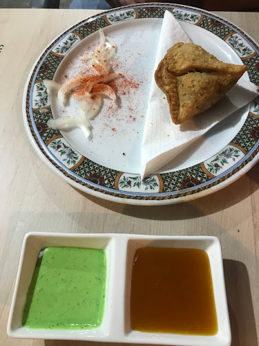 La plaza pizzeria manises Phone number