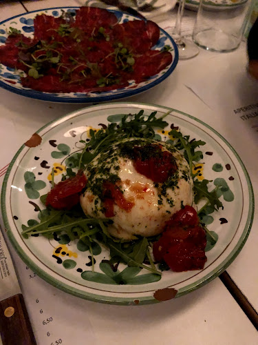 Restaurante Bella's Phone number