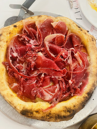 Restaurante Bella's Open Times