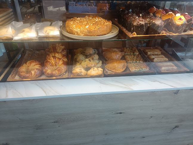 TOUM Tienda a granel & Cafeteria Phone number