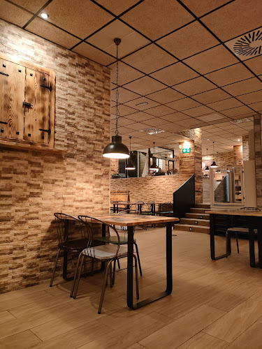 Pizzería Carlos Phone number