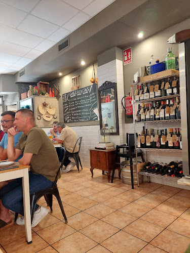 Taberna Fuego Lento Phone number