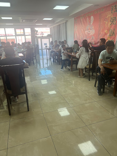 Restaurante Casa de Fideos Hongjie Open Times