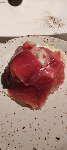 Raza Madrid Barquillo Phone number