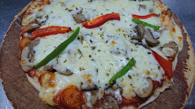 RESTAURANTE PIZZERÍA ARROCERÍA PLAZA Open Times