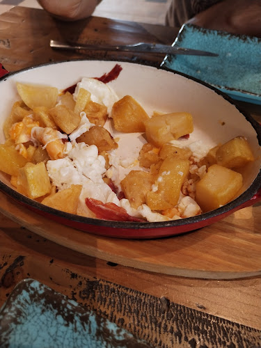 Taberna Siglo Phone number