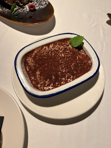 Raza Madrid Barquillo Phone number