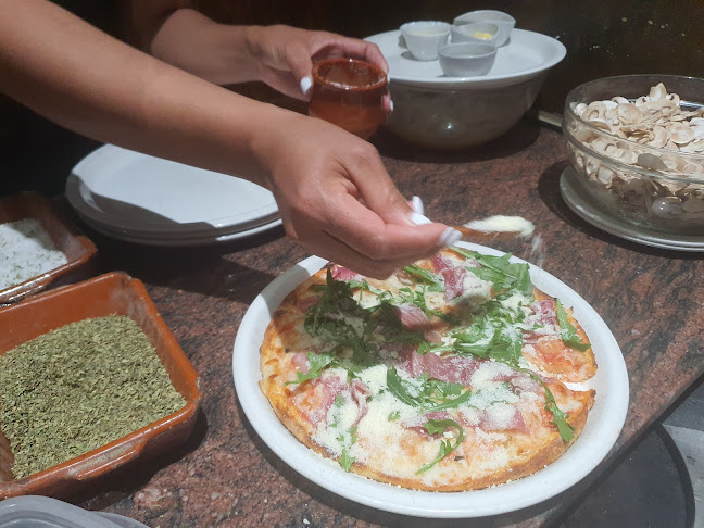 Aroma Pizzería Phone number