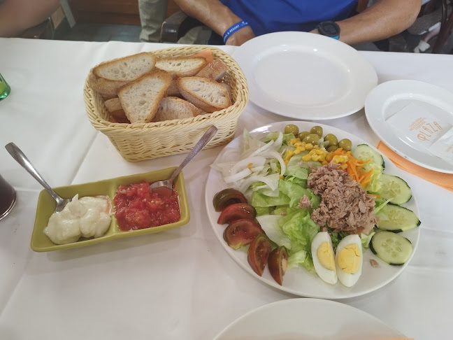 Comments and reviews of RESTAURANTE PIZZERÍA ARROCERÍA PLAZA