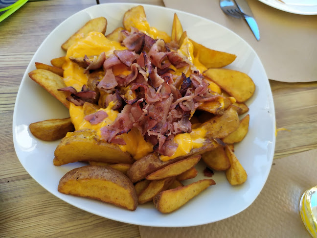 Opinii despre Kims Restaurante în Puerto de Mazarrón - Gastronomía y hostelería