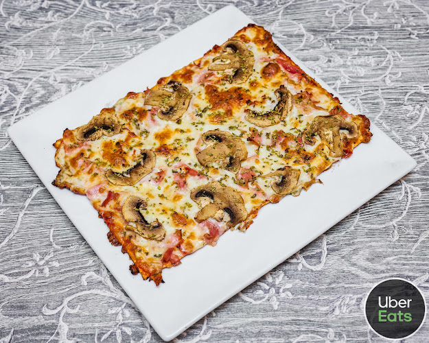 POLLOS AL AST Y PIZZERIA. QUATRE ESTACIONS