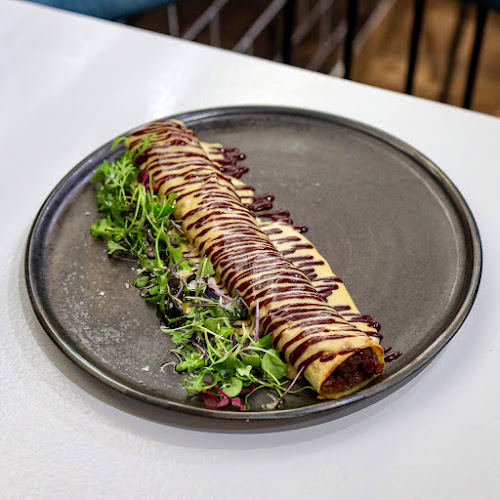 Restaurante Peculiar Phone number