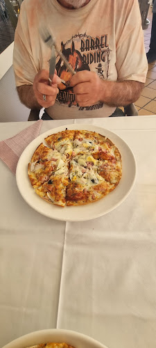 RESTAURANTE PIZZERÍA ARROCERÍA PLAZA