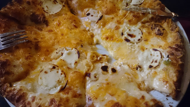 Pizzería Carlos Phone number